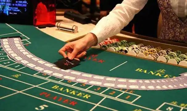 Mobile phone showing royal188 slot sportsbook with badminton tournament schedule